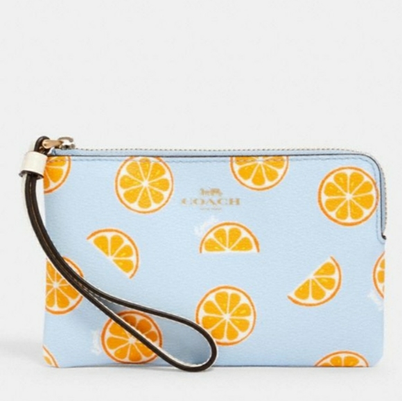 Coach Handbags - Coach Corner Zip Wristlet W/🍊 Print